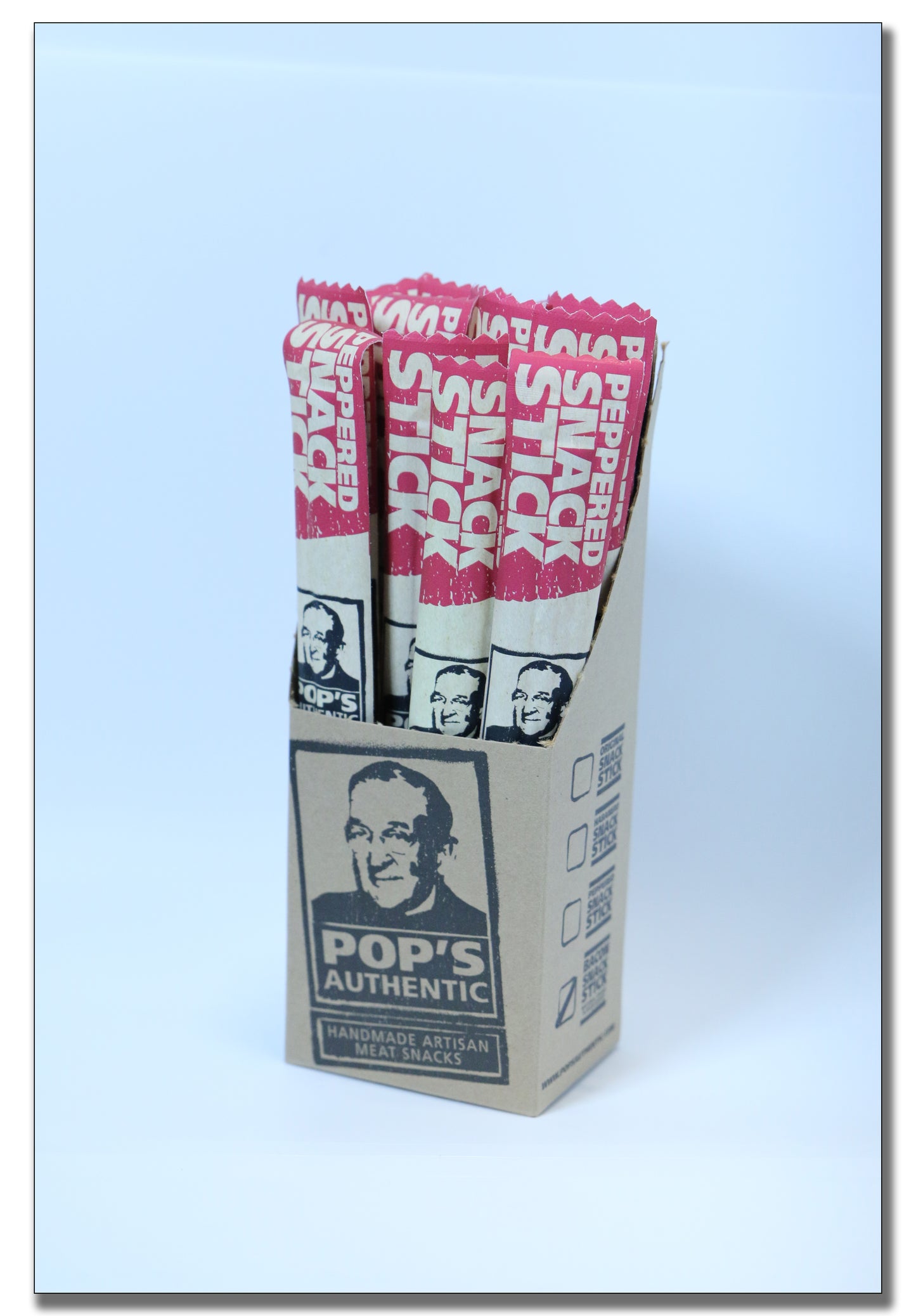 Peppered Snack Sticks packaged in a display box